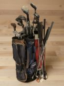 Several golf bags containing assorted irons and drivers including Dunlop, Mizuno, etc.