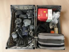 A Canon SX50HS digital camera, a further Powershot S51S camera, various lenses including Vivitar,