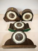 Four oak Art Deco mantel clocks.
