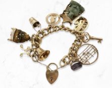 A 9ct yellow gold charm bracelet with ten charms CONDITION REPORT: Gross 95.5g.