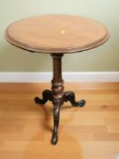A George III style tripod circular occasional table, height 69 cm.