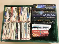 A collection of volumes including Dick Francis, Agatha Christie, etc.