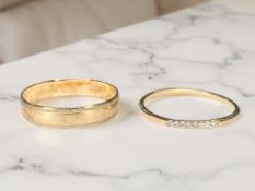 A 9ct gold band ring, and a 10ct gold ring set with diamond chips.