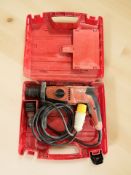A Hilti drill, in box.