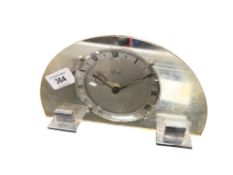 An Art Deco Ferranti electric mantel timepiece, width 22 cm.