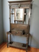 A late Victorian mirror backed hall stand,