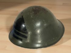 A 20th century military helmet.
