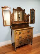 An Art Nouveau walnut three drawer mirror back dressing chest, approx.