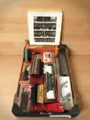 A group of die cast and tin plate rolling stock,