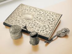 A small telephone number book with embossed white metal cover stamped 925,