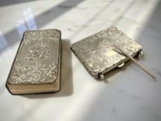 A silver card case with silver pencil, Birmingham 1907 and silver-fronted bible,