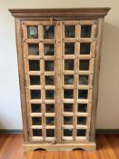 A glazed hardwood double door bookcase with shelved interior, 95 cm x 46 cm x 165 cm.