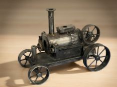 A metal model of Stephenson's rocket, length 27 cm.