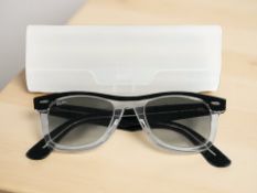 A pair of Rayban Wayfarer sunglasses.