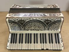 An Italian Settimio Soprani Three piano accordion.