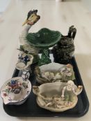 An Italian ceramic figure of a bird, a Dartmouth fish tazza, a wood pottery jug,