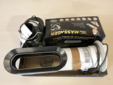 A Dyson hot and cold fan, kitchen juicer and a massager.