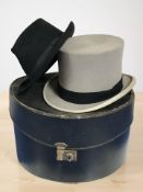 A gent's grey felt top hat and a further Christys of London with a hat box