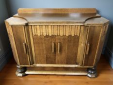 A 1930's oak buffet sideboard,