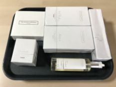 A group of White Company items including scented candle, hand wash, scent diffuser refill,