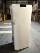 A Siemens upright freezer.