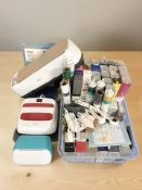 A quantity of rolls of vinyl, various marker pens, cricut equipment.