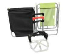 A magna cart and two folding outdoor chairs.