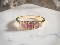 A 9ct gold pink stone ring, size V CONDITION REPORT: 2.