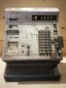 A vintage Gross enameled metal cash register.