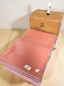 A quantity of work books, box of glue sticks.