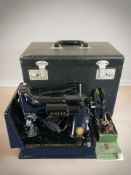 A Singer 221K featherweight electric sewing machine with lead and pedal in case and accessories