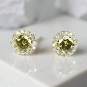 A pair of 14ct gold yellow diamond stud earrings,