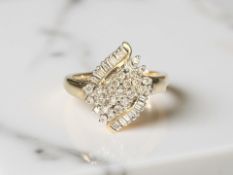 A 9ct gold diamond cluster ring, size S CONDITION REPORT: 3.