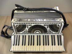 An Italian Alvari piano accordion.