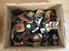 A collection of various trophies.