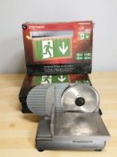 An Andrew James commercial slicer and a group of emergency LED lights in boxes.