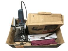 A Bosch GWS 8-115C disk grinder together with a Makita orbital sander and a Pro lux sealing iron