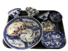 A group of oriental export blue and white plates and dishes