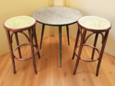 A pair of bentwood and caned stools, height 76 cm, together with an occasional table.