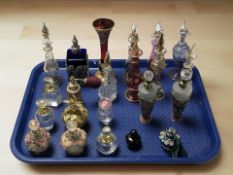 A collection of decorative glass perfume bottles