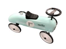 An enameled metal tin plate ride-on race car, length 79 cm.