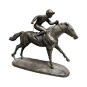 A Heredities figure of Jockey on horse back,