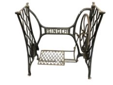 A cast iron Singer treadle sewing machine base, width 69 cm.