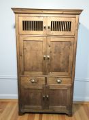 A 20th century pine pantry cupboard, 113 cm x 47 cm x 183 cm.