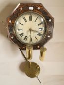 A 19th century painted rosewood effect octagonal wall clock width 32 cm,