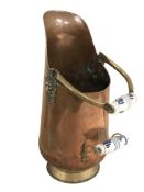 A Victorian copper and brass coal scuttle, height 49 cm.