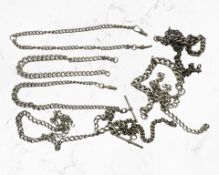 A group of antique silver Albert chains.