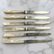 A set of six mother of pearl-handled silver fruit knives