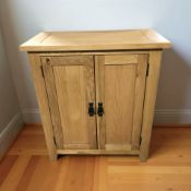 A modern oak double door side cabinet, 70 cm x 36 cm x 80 cm.