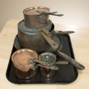 A group of Victorian copper sauce pans, skillet,